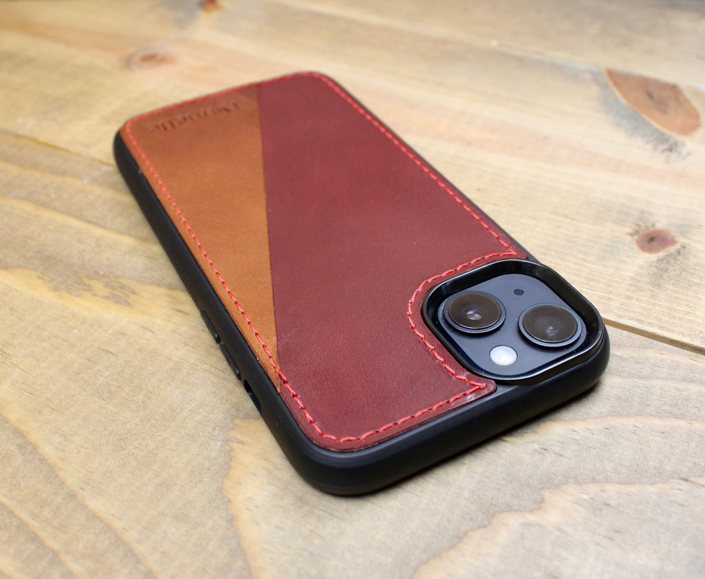 Buck Brown and Burgundy Premium leather iPhone case with a sleek design, durable protection, and a soft, handcrafted finish for a stylish and sophisticated look.