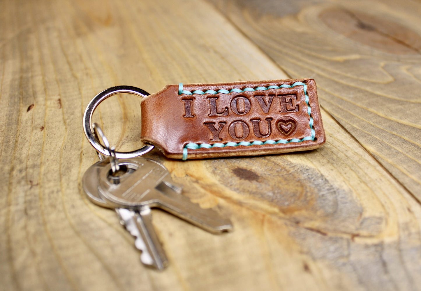 Personalized Buck Brown Leather Keychain with Aquamarine Thread and Champagne Keyring