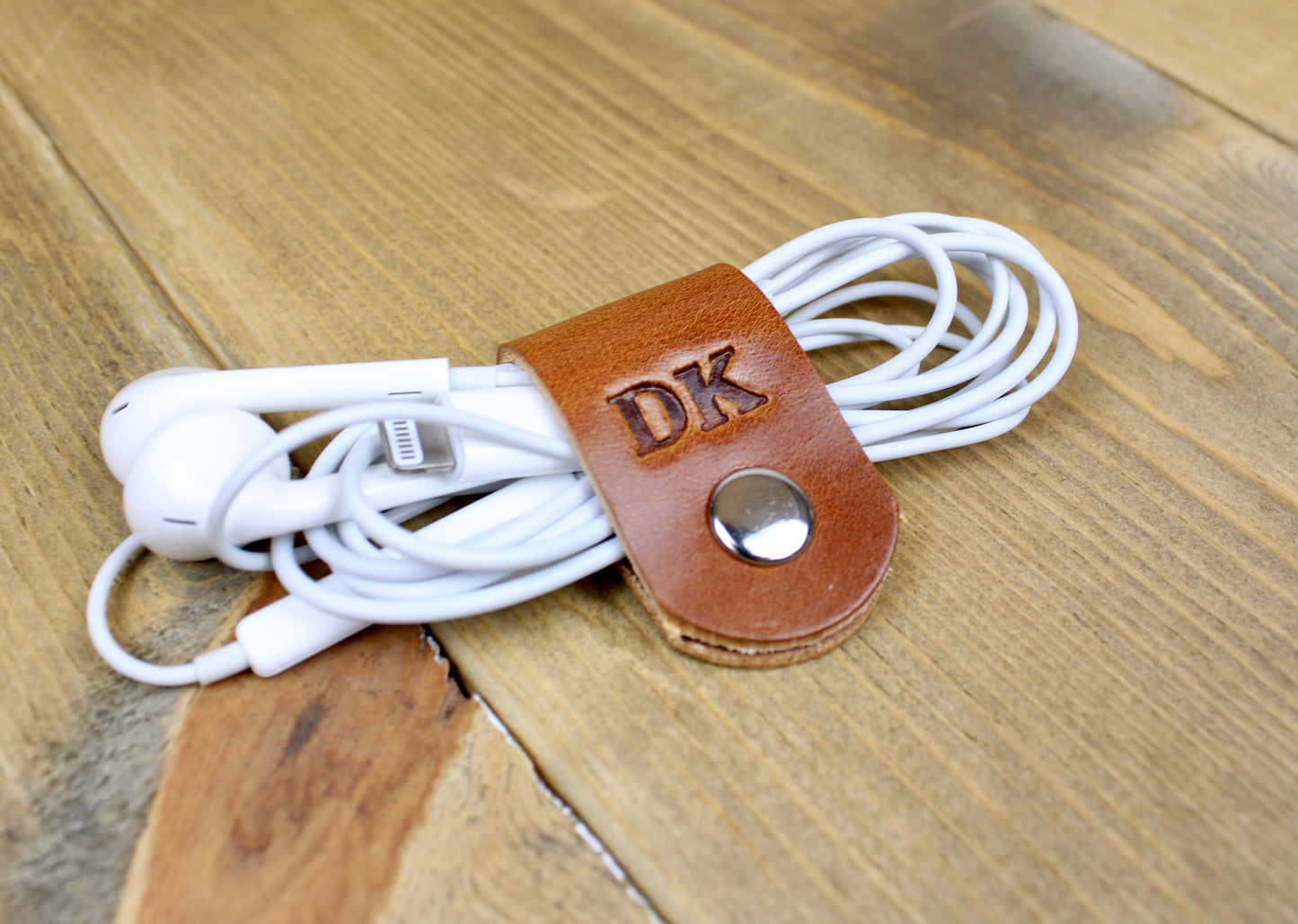 Buck Brown Cord Organizers. Leather Cord Organizers. Leather Accessories. 3rd anniversary leather gift for men or women. Leather cord tacos. Leather cord wraps. Personalized leather cord wraps. handmade leather cord organization.