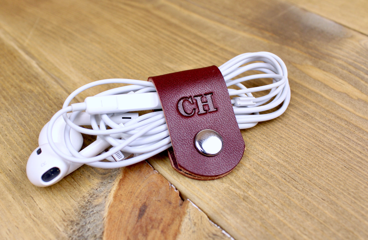 Burgundy leather cord organizers. Leather Cord Organizers. Leather Accessories. 3rd anniversary leather gift for men or women. Leather cord tacos. Leather cord wraps. Personalized leather cord wraps. handmade leather cord organization.