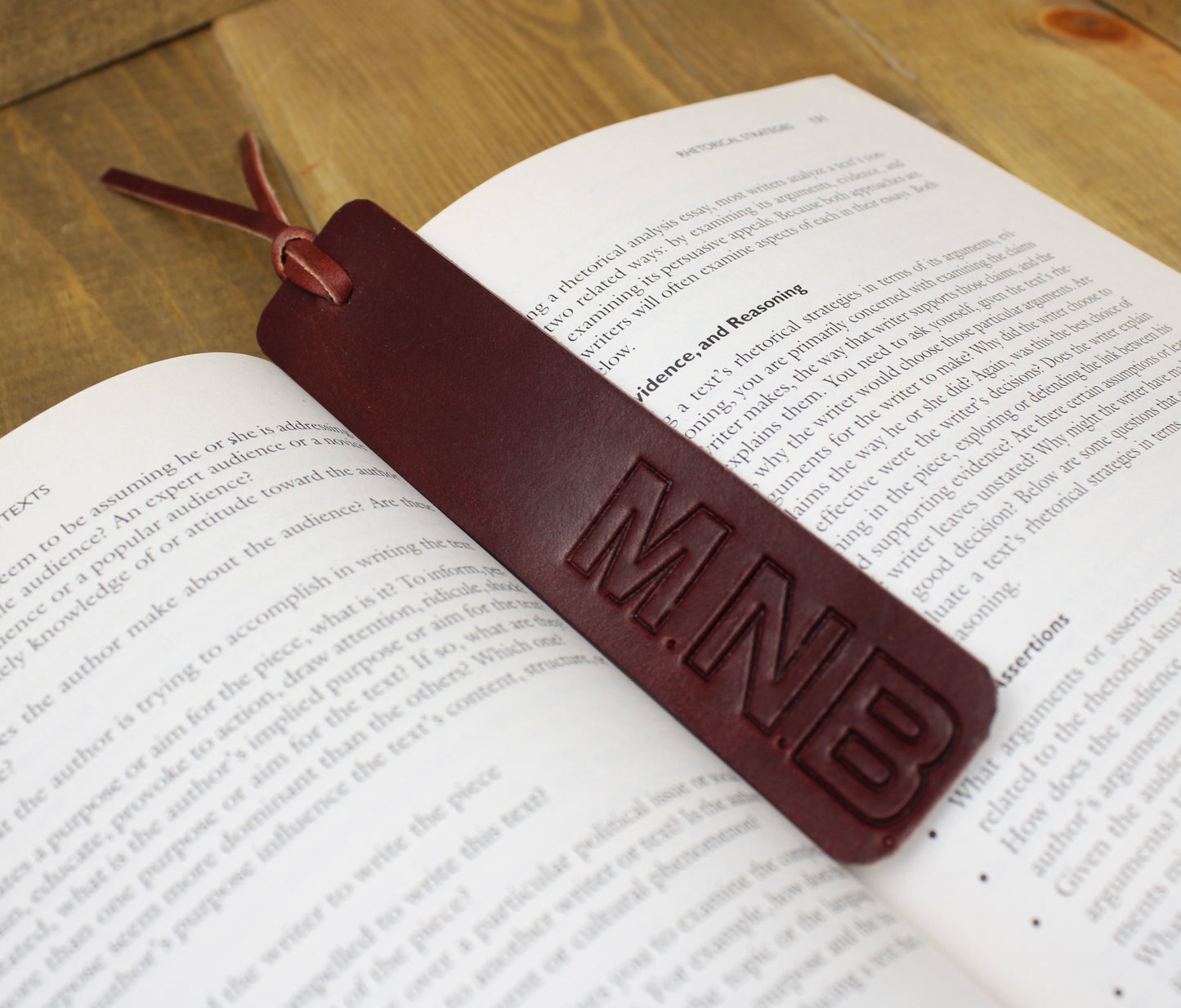 Handcrafted leather bookmark with a sleek design and durable finish, adding a touch of elegance to your reading experience.