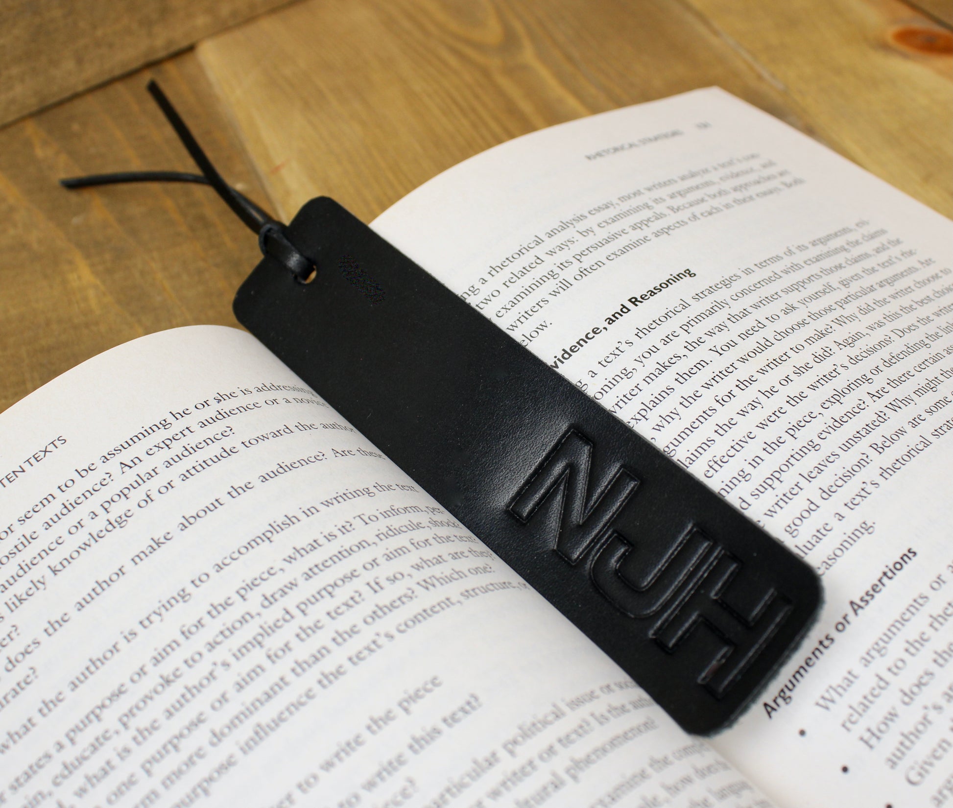 Elegant leather bookmark with a smooth finish and durable design, perfect for marking your place in any book with style