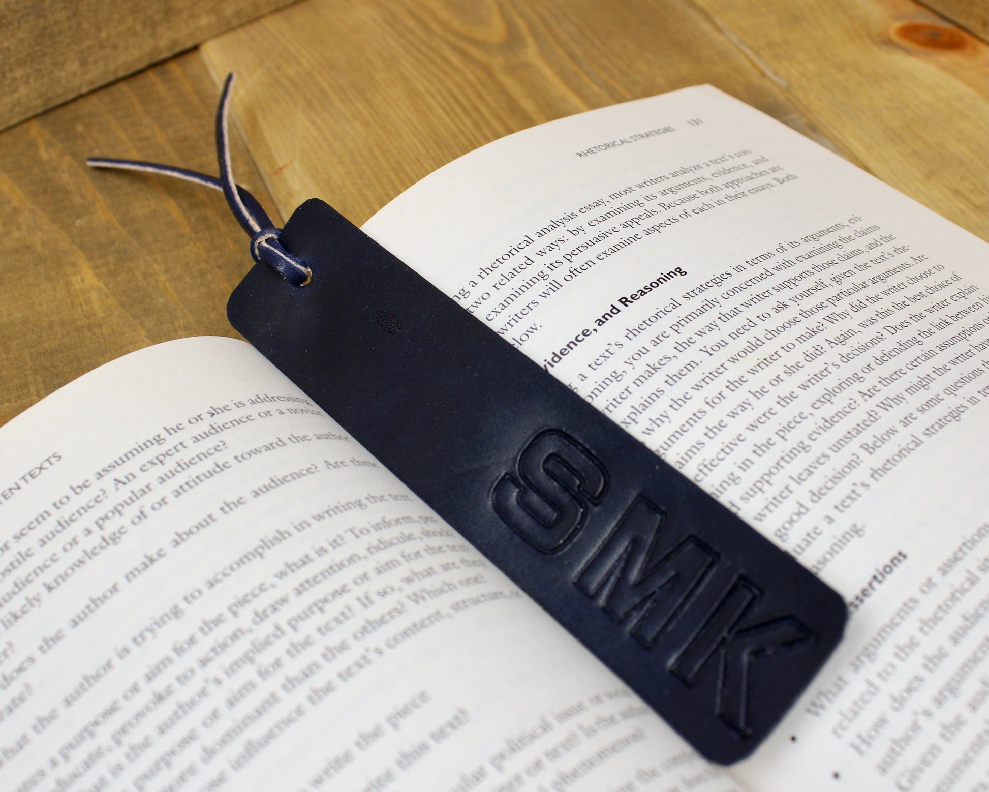Handcrafted leather bookmark with a sleek design and durable finish, adding a touch of elegance to your reading experience.