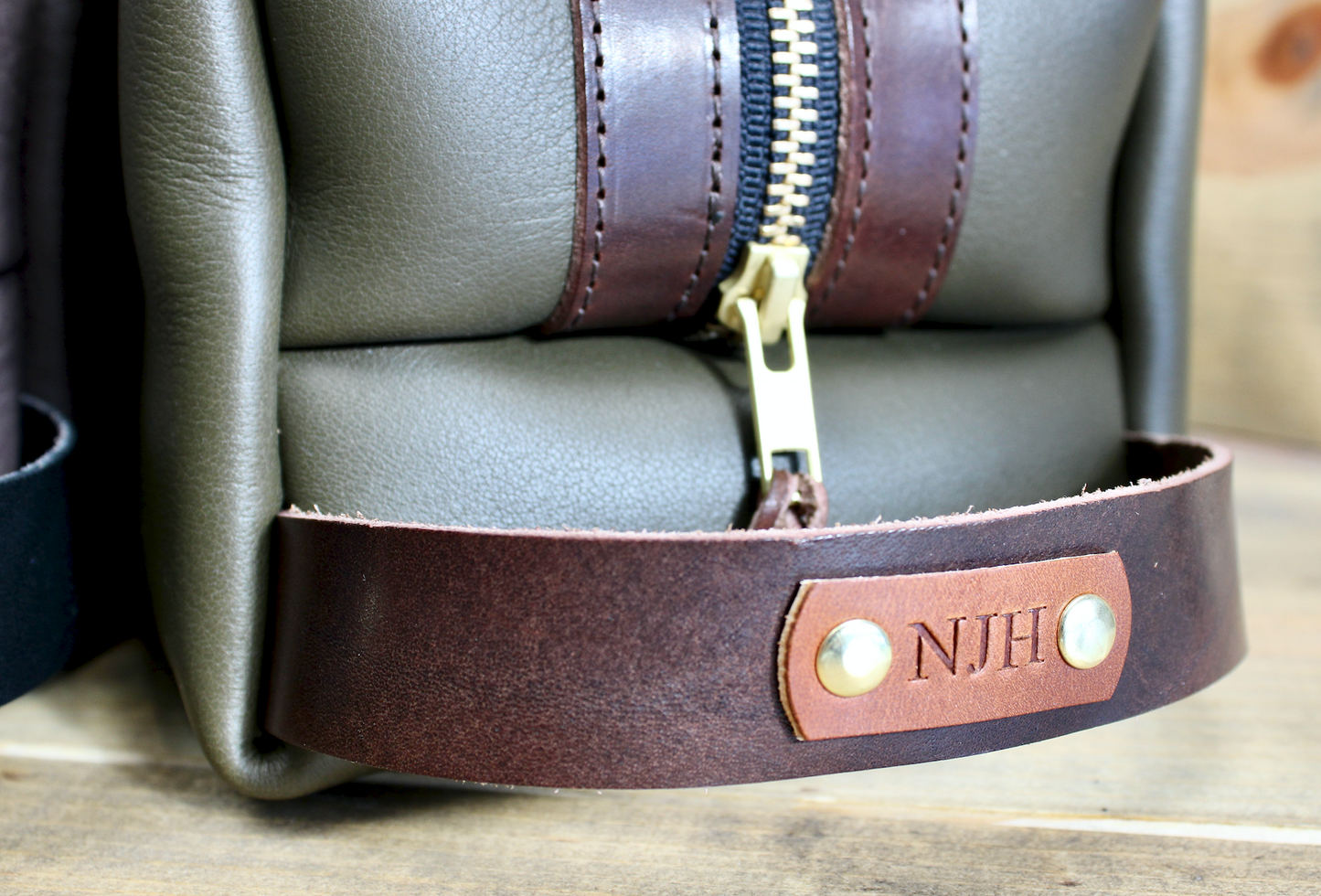 Handcrafted leather Dopp kit with a durable, vintage-inspired design, featuring premium full-grain leather, a sturdy zipper, and a spacious interior for organizing toiletries on the go