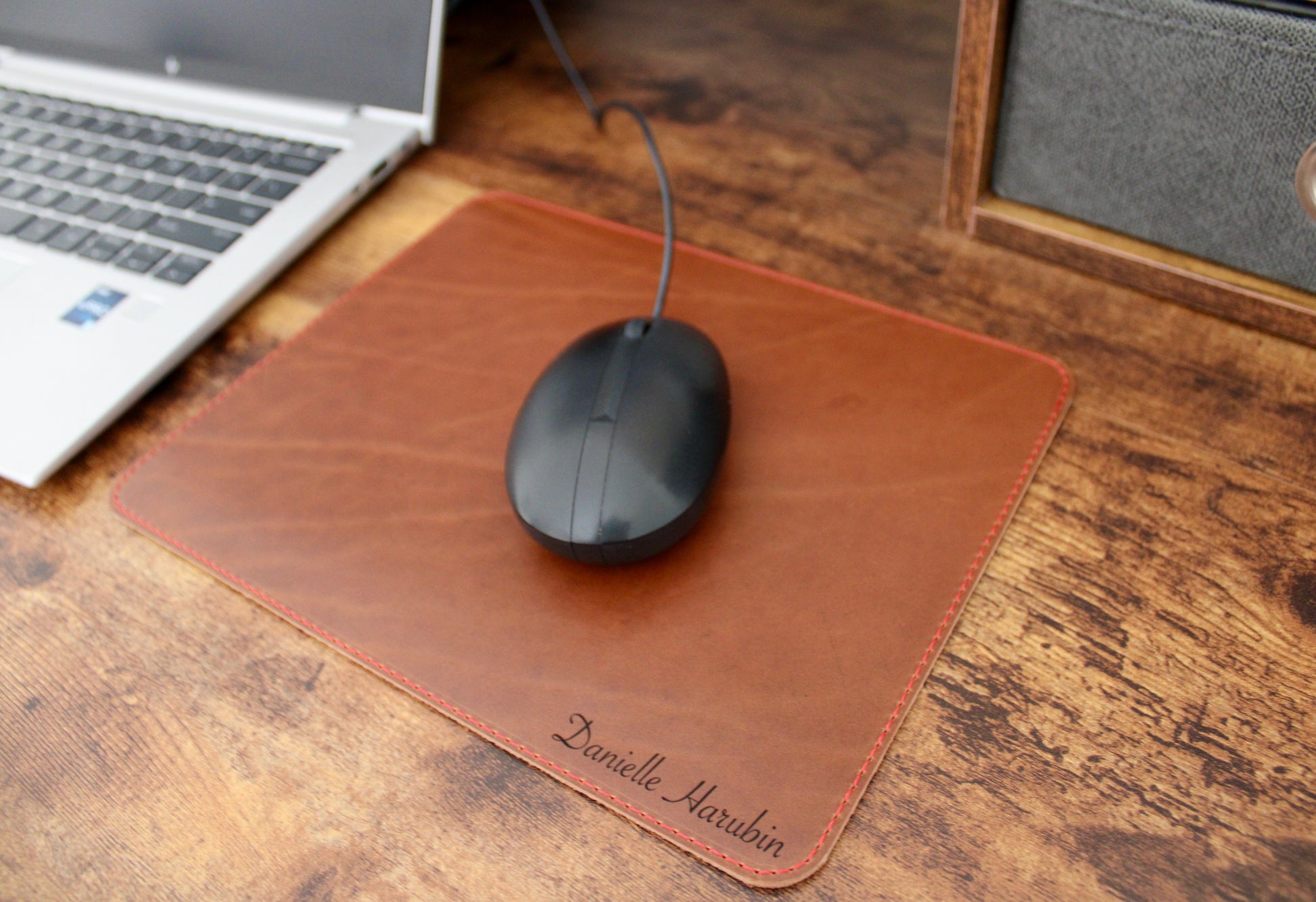 Premium wheat leather mousepad with a smooth finish and natural texture, perfect for enhancing any workspace